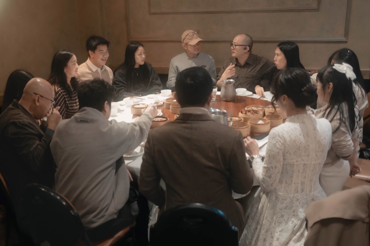 Family sharing yum cha around a round table after the ceremony